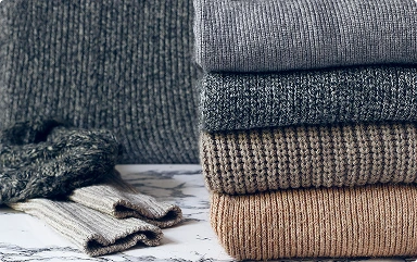 stack-cozy-knitted-sweaters-autumn-winter-concept-knitted-wool-sweaters-pile-knitted-winter-clothes-sweaters-knitwear 1